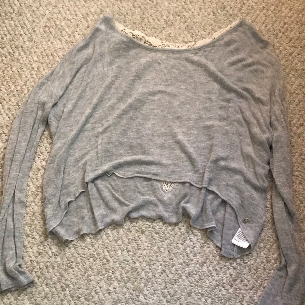 Cropped light sweater